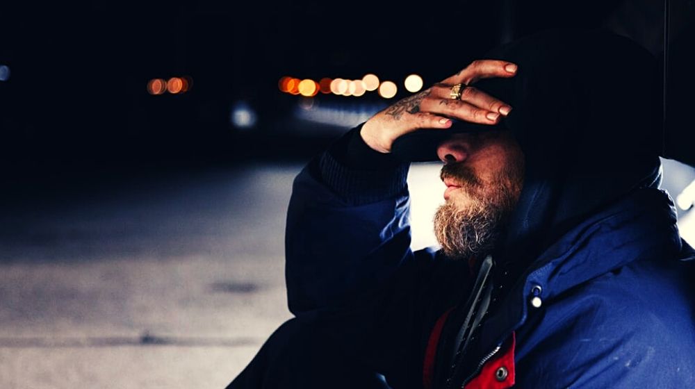 depressed man | Number of Americans Seeking Unemployment Aid Jumped by 5.25 Million Last Week | Featured
