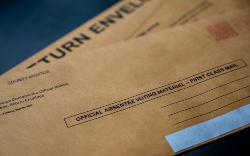 Selective Focus on Brown Official Absentee Ballot |Police Discovers Stolen Checks and Absentee Ballot in Texas Man’s Vehicle