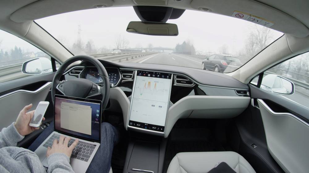 Self-driving Tesla Model S car autopilot demanding driver attention | Tesla Issues Recall for 817,000 EVs Over Seat Belt Reminders | featured
