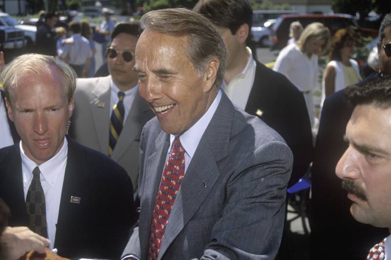 Senator Bob Dole smiles as he meets people at a rally at Temple Christian School | Bob Dole
