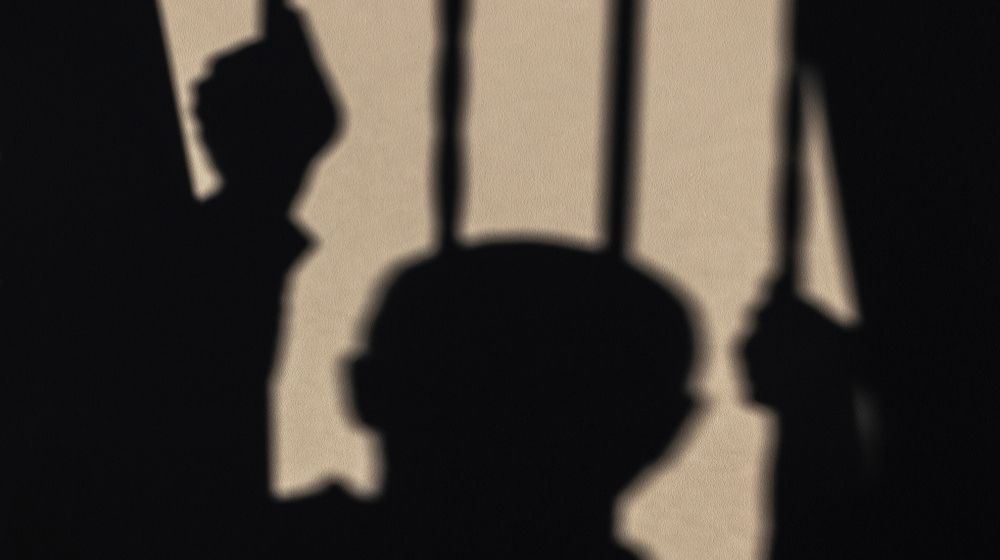 Shadow of man in prison-The US in the 'Process of Communicating With Iran' Over Detained Americans-ss-Featured