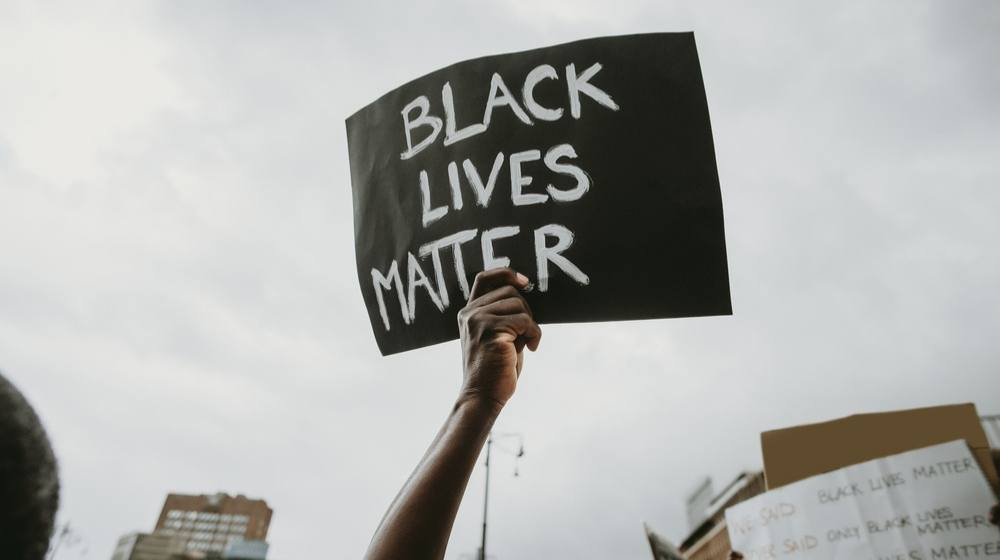 Sign Saying Black Lives Matter-BLM Says Criticism of Patrisse Khan-Cullors Is a Terror Tactic by White Supremacists-SS-Featured