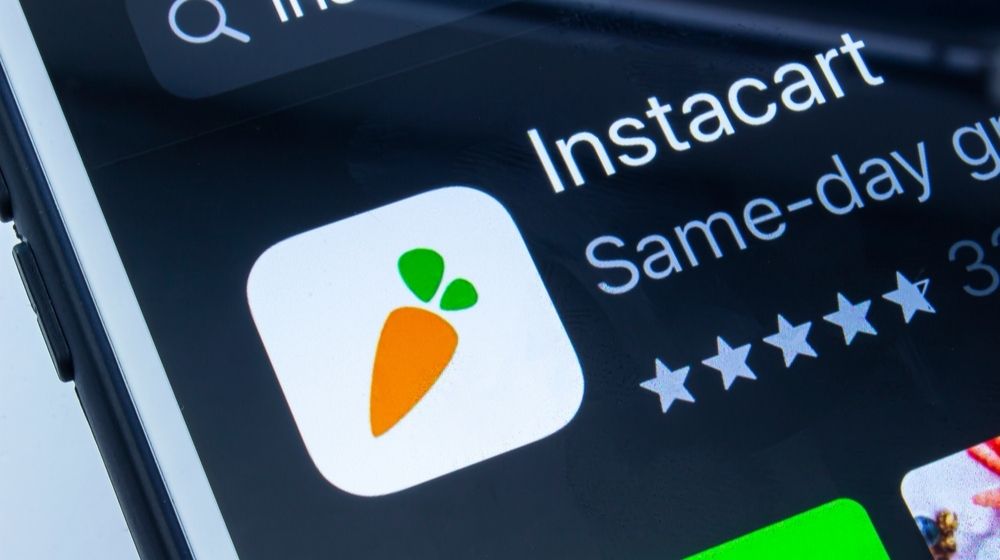 Smartphone with a Instacart Application | Walmart and Instacart Team Up for Same-Day Delivery Service | Featured