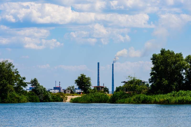 Smoke pipes and buildings of Zaporizhzhia Nuclear Power Station near city Enerhodar | Ukrainian power plant fire, global supply chain, Paralympics & more