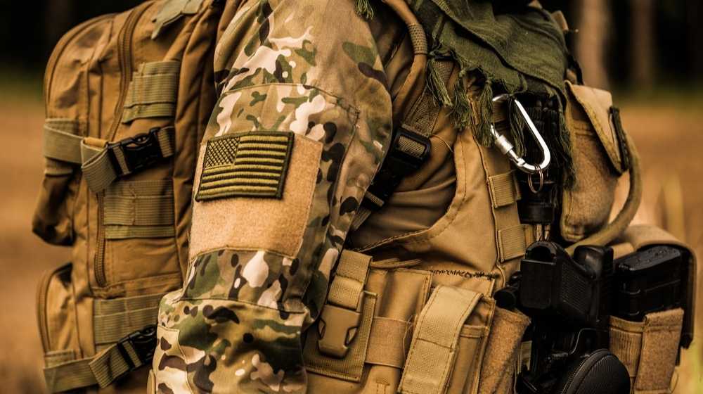 Soldier in camo uniform-Biden Defense Secretary Says US Forces Ready to 'Fight Tonight' after North Korea Warning -ss-Featured