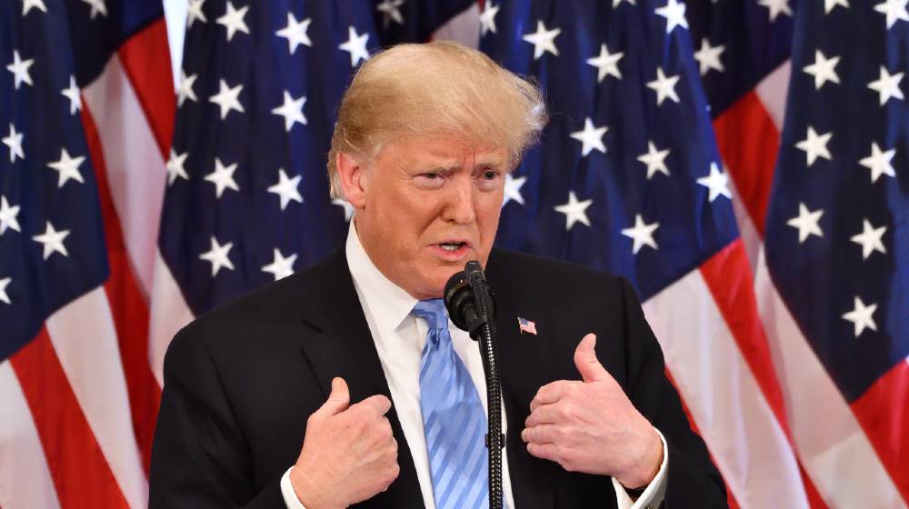 Stable Genius Trump President of the United States gestures as he addresses a press conference | First Politician in the West to Identify the Source of Terror | featured