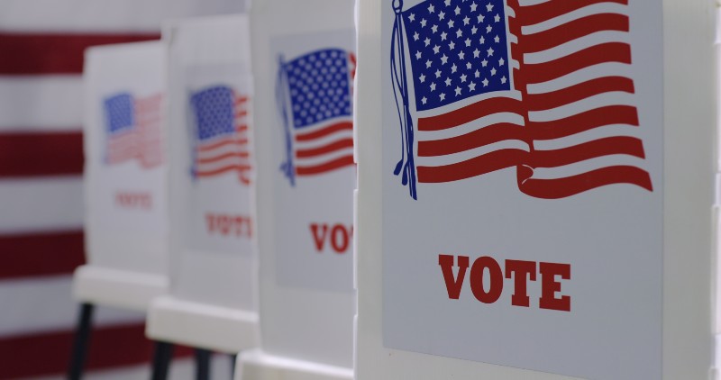 Straight on row of voting booths at polling station during American election | Election Primaries, Abortion Rights Protests, Jonathan Karl & More