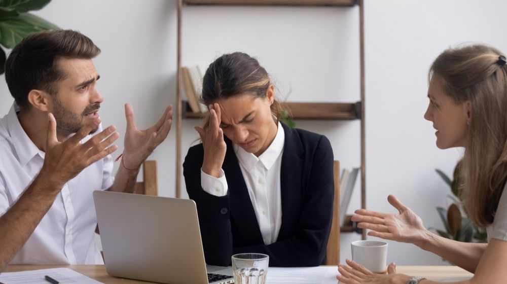 Stressed Office Employee Manager | CDC Advises Employees Not to Argue with a Customer If They “Become Violent” | Featured