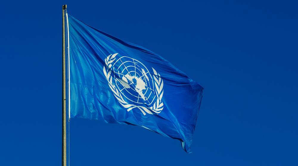 United Nations flag fluttering in the wind | United Nations Suspends Russia From Human Rights Council | featured