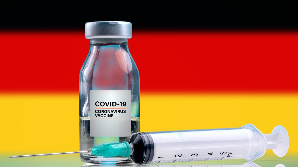Vaccine and syringe injection, Germany Flag background-German-SS-Featured
