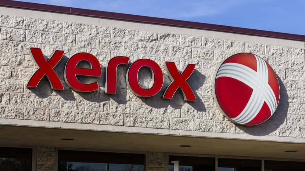 Xerox Corporation Logo and Signage at a Customer Care Center | Xerox Announces App That Tracks Employees with Their Consent | Featured