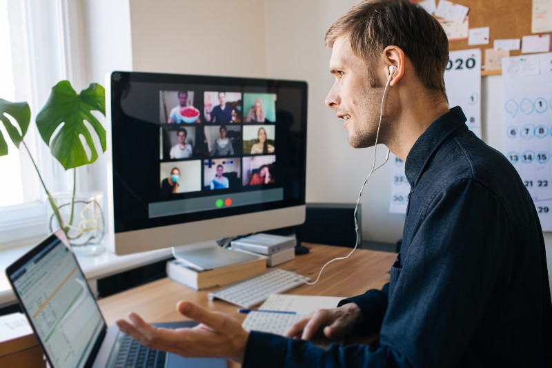 Young man having video call via computer in the home office | Zoom Call