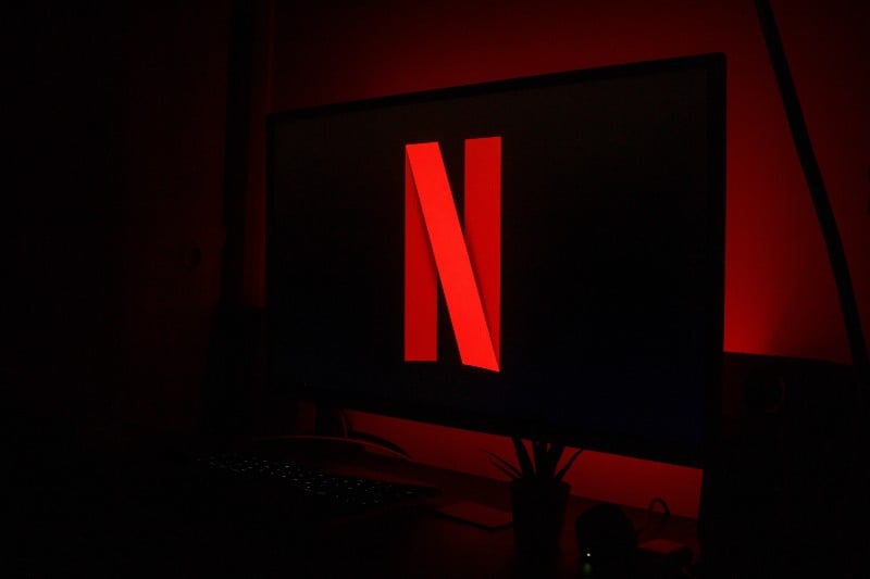 black flat screen tv turned on near black computer keyboard-Kevin Spacey