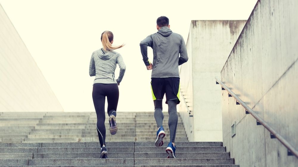 Couple Running Upstairs | People Start Bringing Their Workouts Outdoors Amid COVID-19 Pandemic | Featured