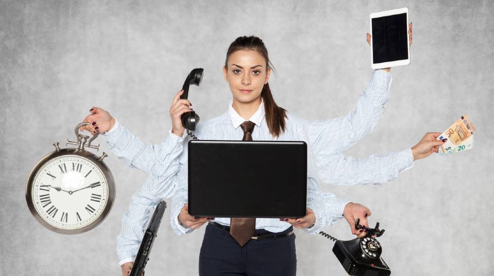 modern businesswoman replaces several people at once | 4 Practical Ways to Accomplish More in Less Time | featured