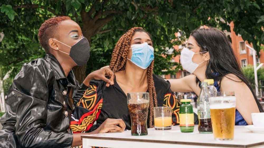 Three Multiracial, Black, Mixed Raze and Caucasian Friends on a Bar Terrace Drinking a Drink | It's Getting Ridiculous,' Bar Owner Says of Alcohol Ban During Allegheny County Protest | Featured
