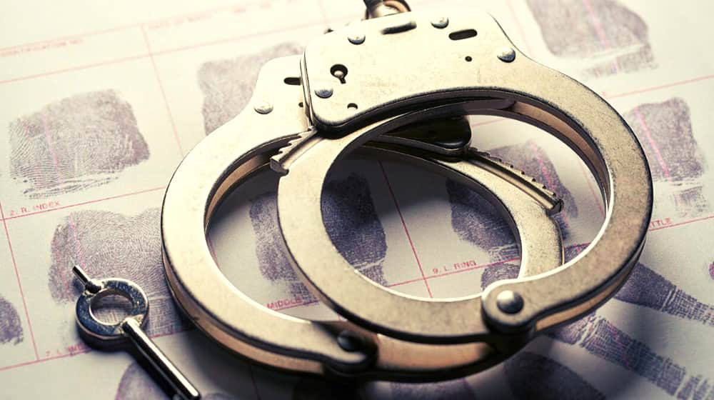grey handcuff | Eight Arrested at Trump Rally in Colorado Springs | Featured